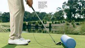 Best golf drills to stay down on swing Importance of Staying Down on the Golf Swing