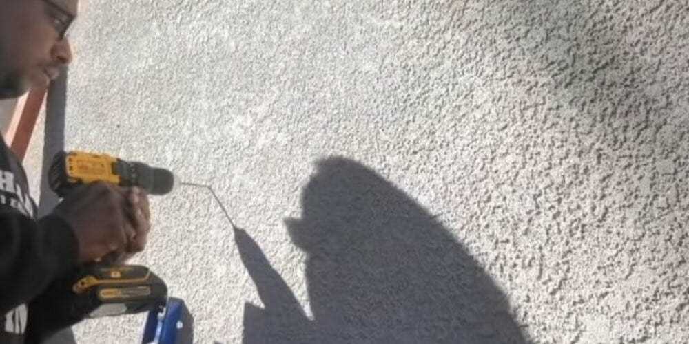 5. Use a Vacuum or Mask to Control Dust