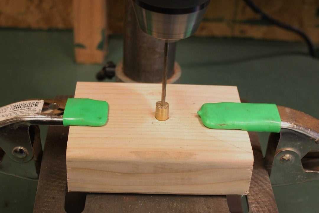 How to accurately drill a hole in the center of a rod Using a center punch for precise marking