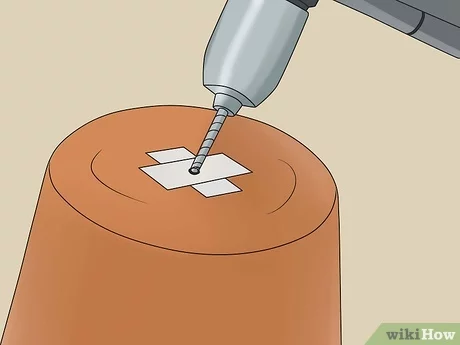 Steps to drill holes in clay pots 4. Add drainage trays