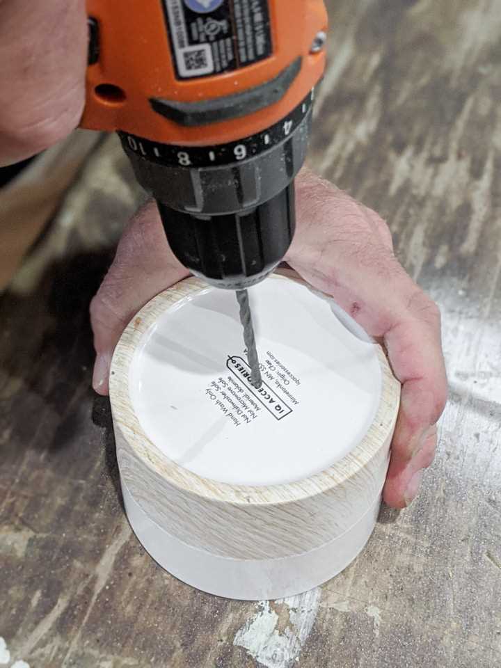 Step-by-step guide on drilling holes in terracotta pots 6. Support the pot