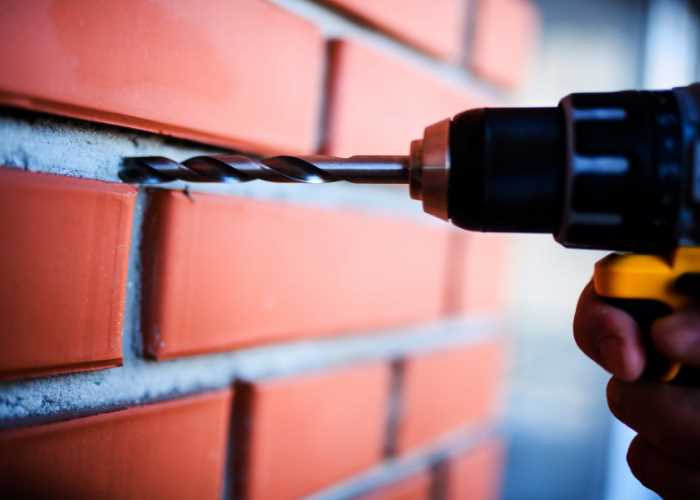 How to drill into brick without a hammer drill 2. Vacuum Attachment
