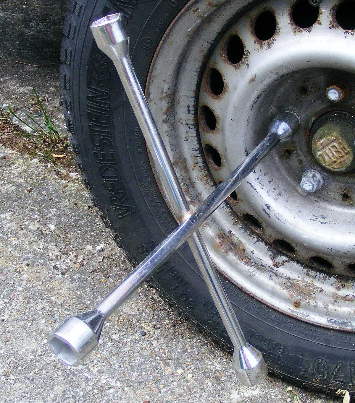 How to Remove Lug Nuts without a Wrench - Step-by-Step Guide Use a Breaker Bar