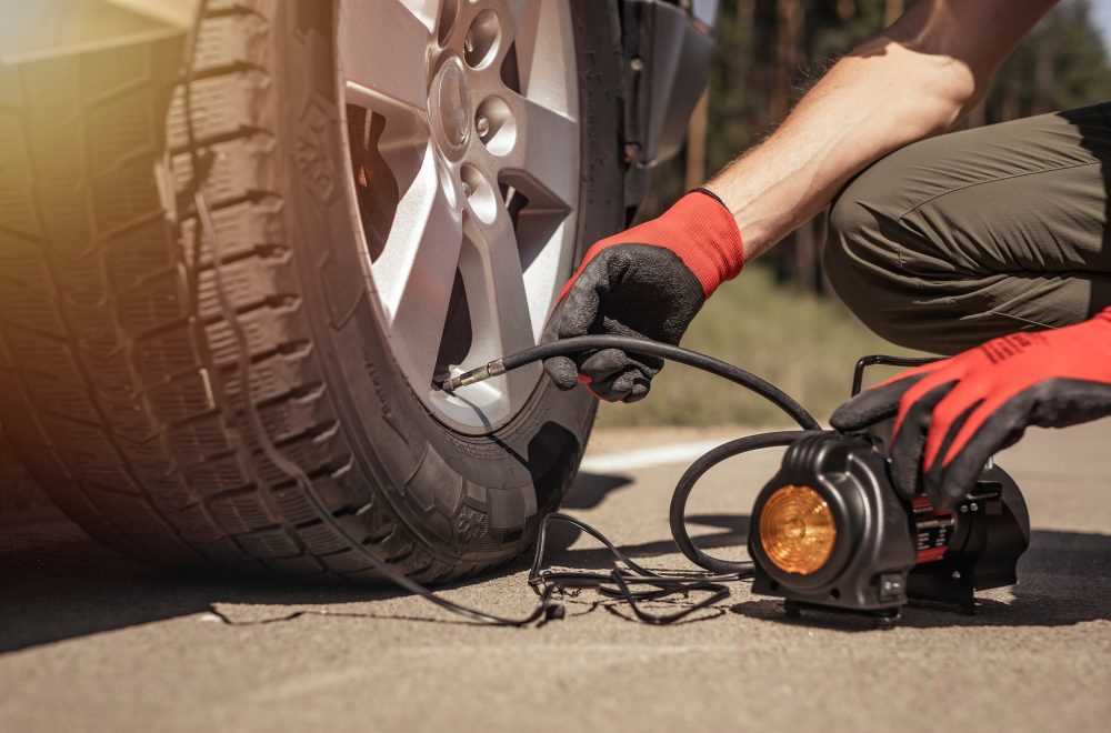 How to Inflate Tires with an Air Compressor Attaching the Air Compressor to the Tire Valve