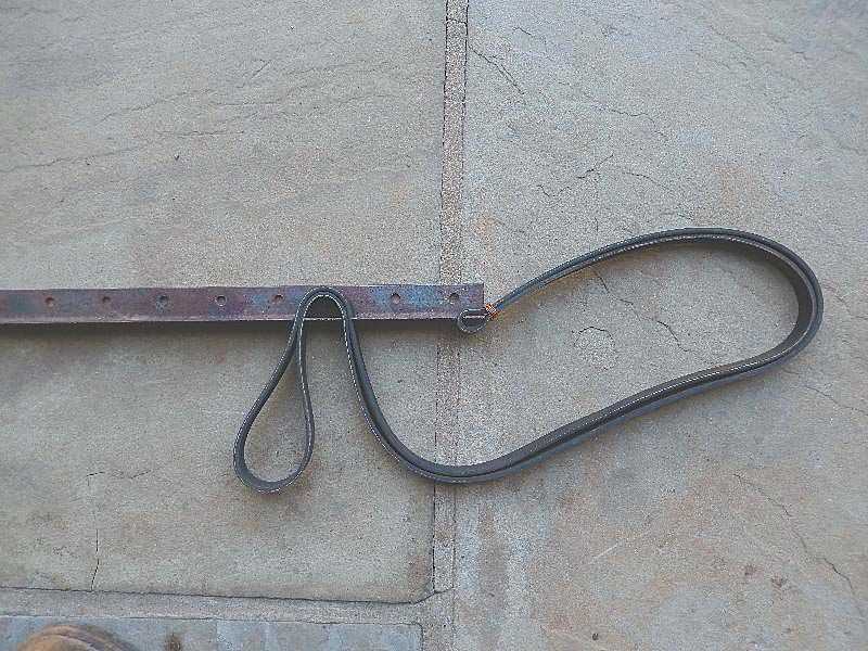 DIY: Learn How to Make a Strap Wrench in a Few Simple Steps Step 4: Create a loop with the strap