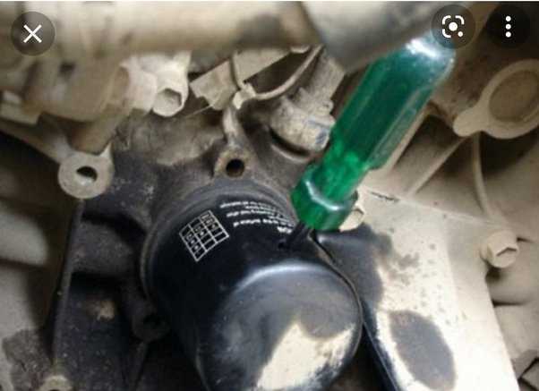 How to Remove an Oil Filter Without a Wrench | Easy DIY Guide Step 2: Prepare the Area