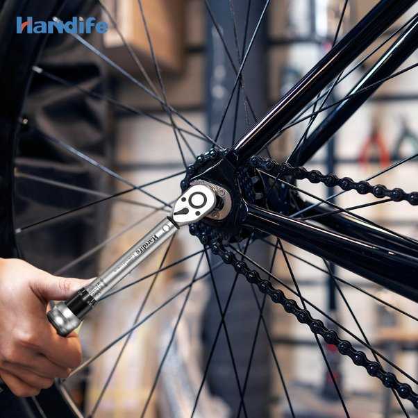 How to Tighten Lug Nuts Without a Torque Wrench - Step by Step Guide 2. Use a Lug Wrench to Re-Tighten