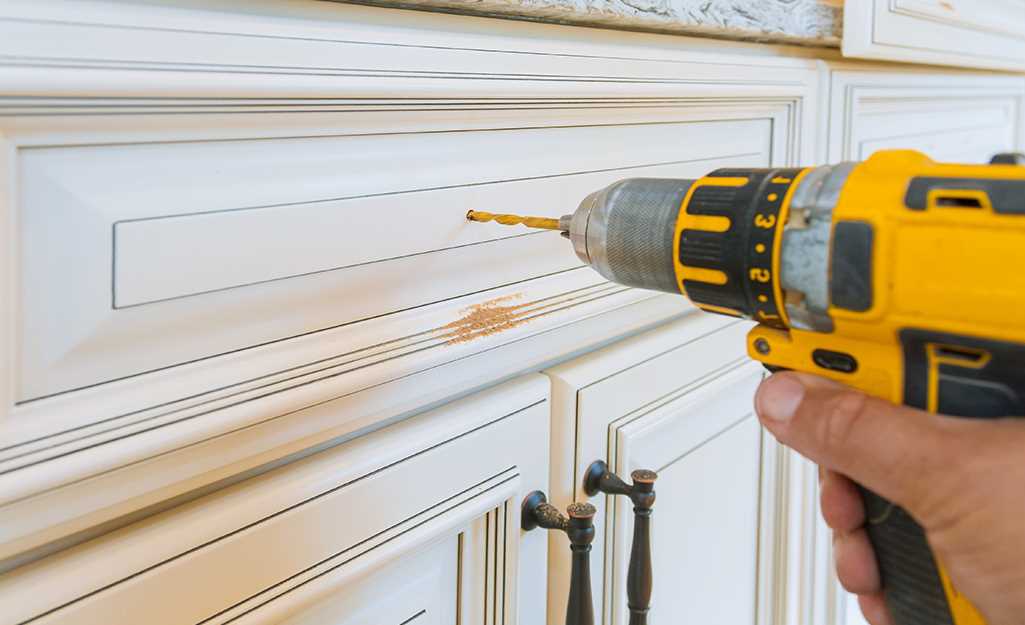 Choosing the Right Drill Bit Size for Cabinet Handles Step 4: Attach the Drill Bit